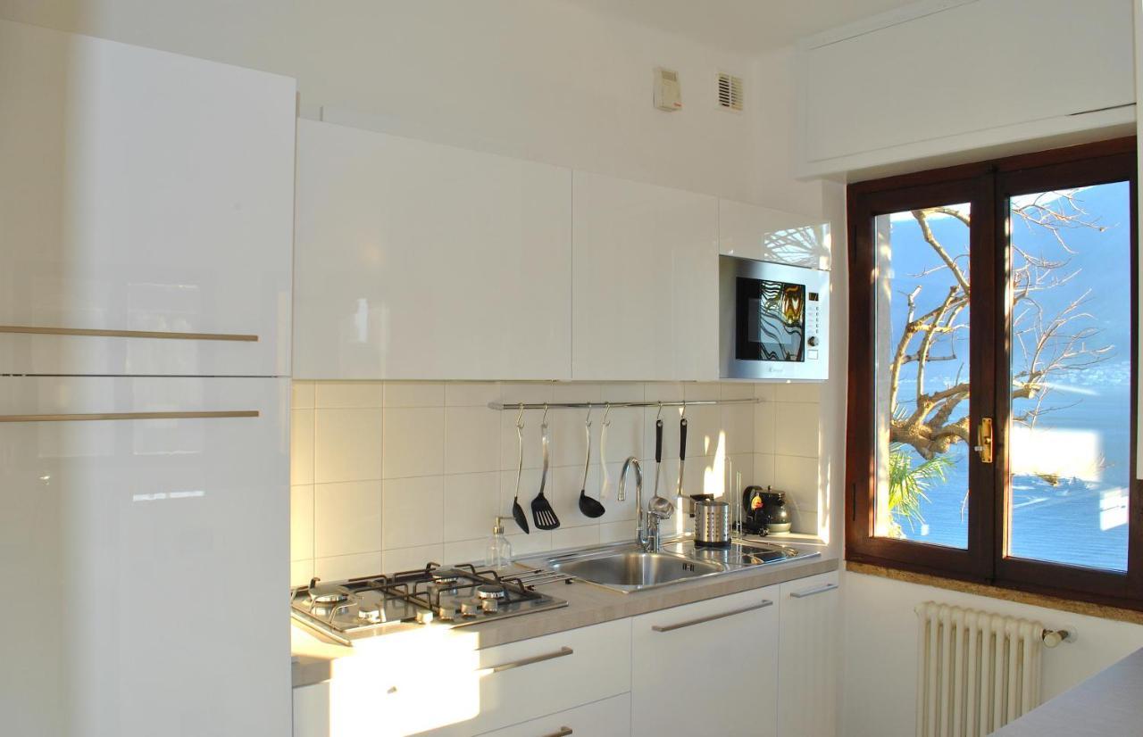 Apartment The Palm With Garden Sala Comacina Exterior foto